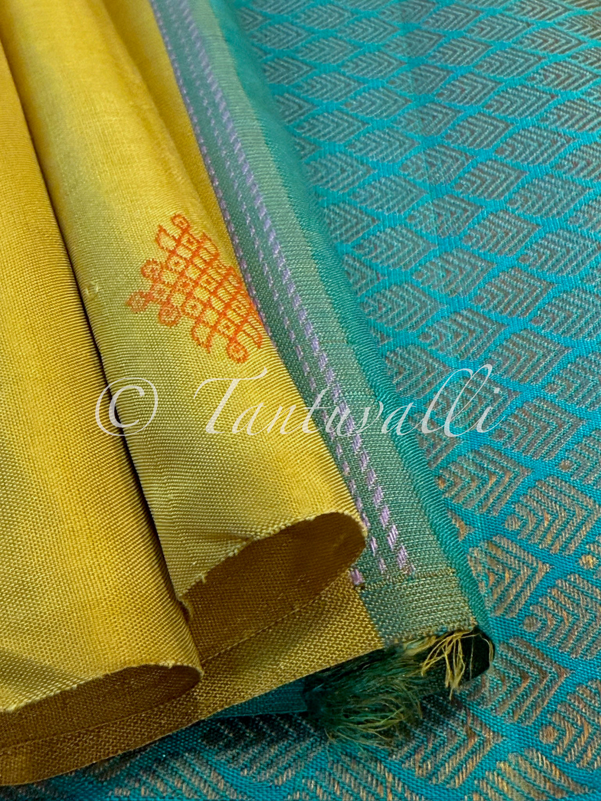 Bright Yellow Borderless with Kolam Buttas and Teal Green Pallu
