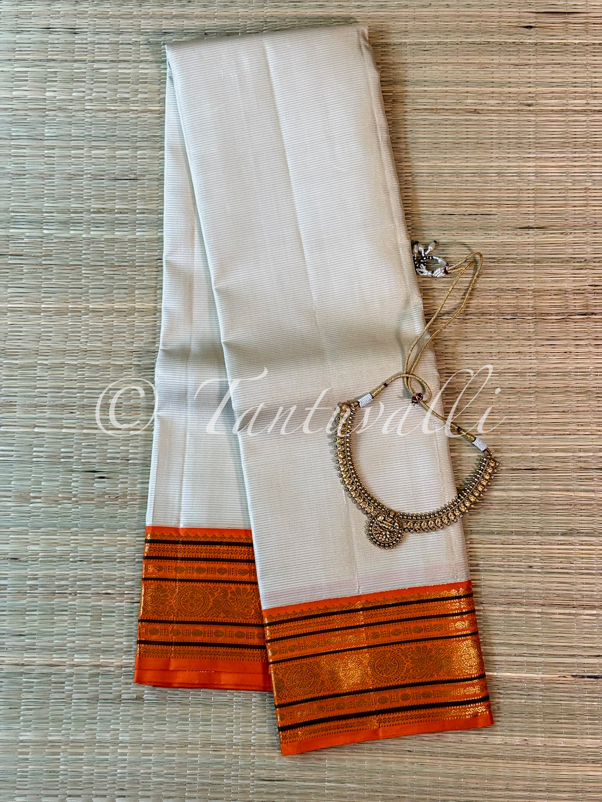 Ivory Vaira Oosi with Orange Varisaipet Korvai