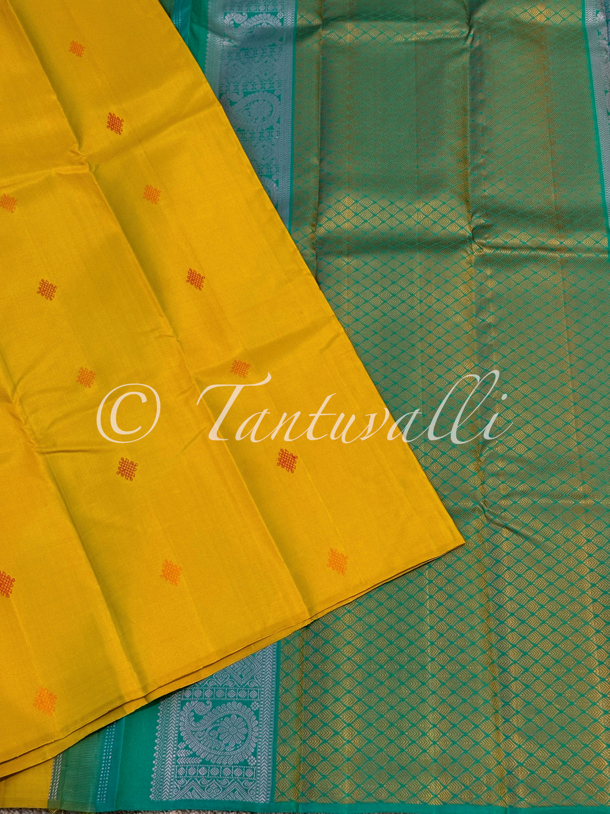 Bright Yellow Borderless with Kolam Buttas and Teal Green Pallu