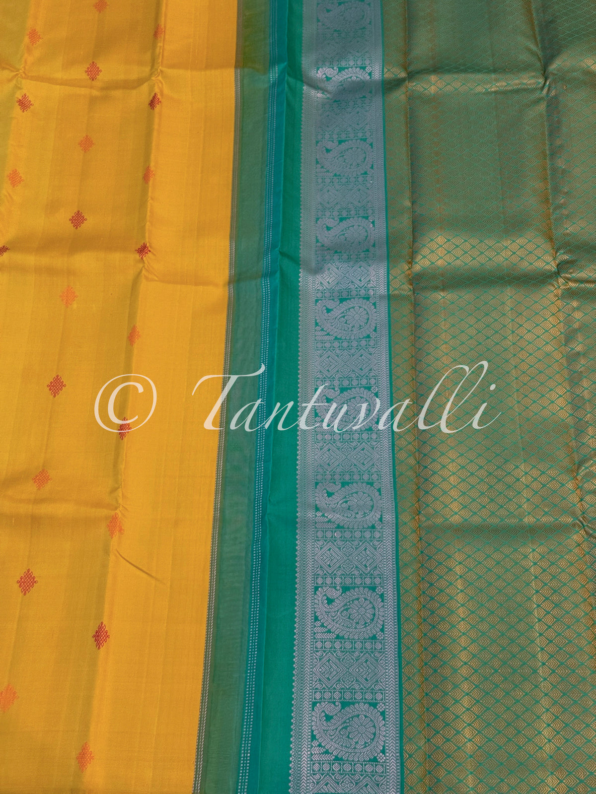 Bright Yellow Borderless with Kolam Buttas and Teal Green Pallu