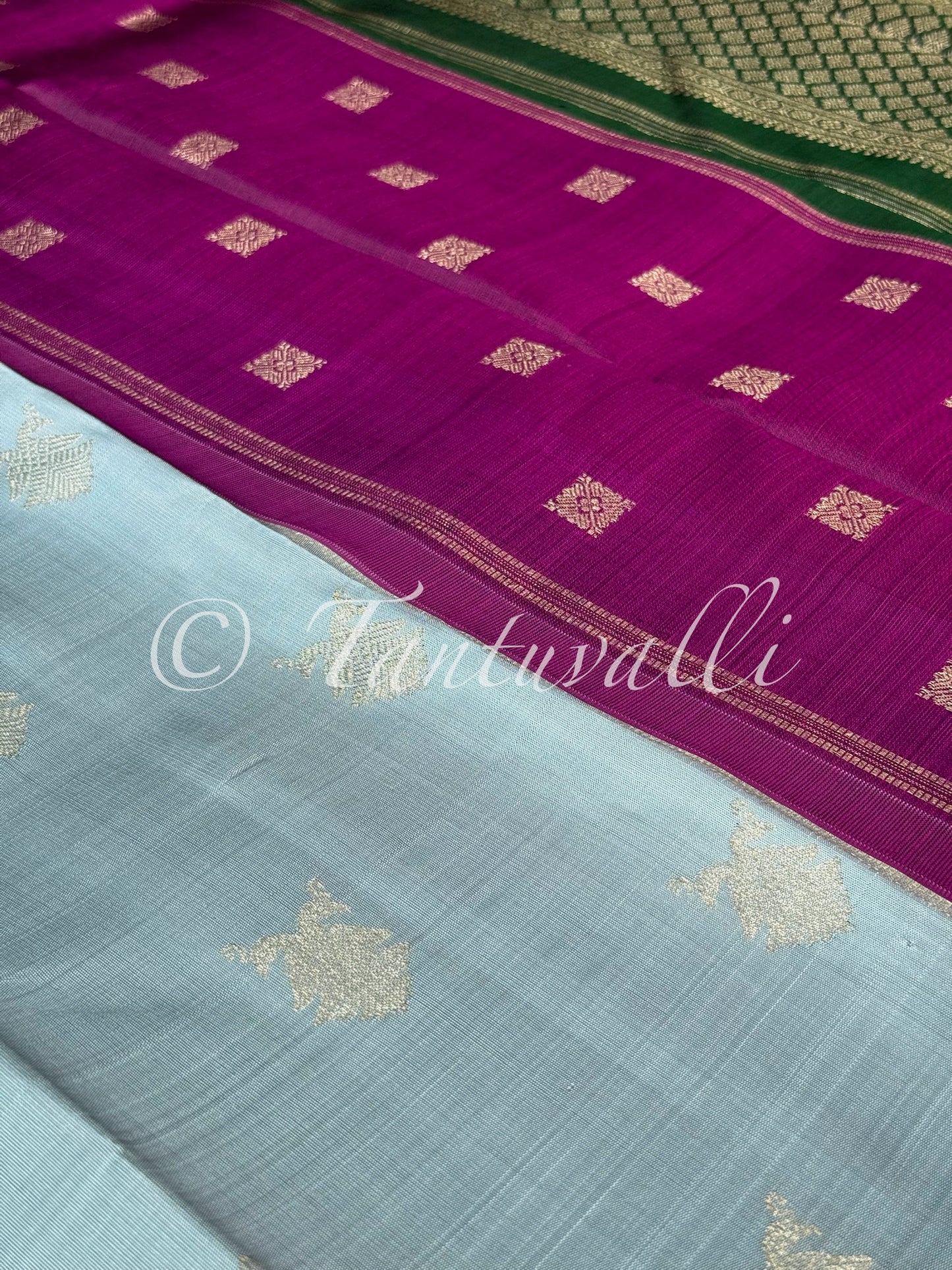Bluish Grey Vaadaamalli and Bottle Green Double Pallu Pure Zari