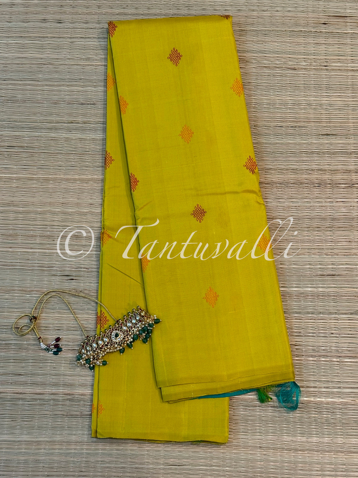 Bright Yellow Borderless with Kolam Buttas and Teal Green Pallu