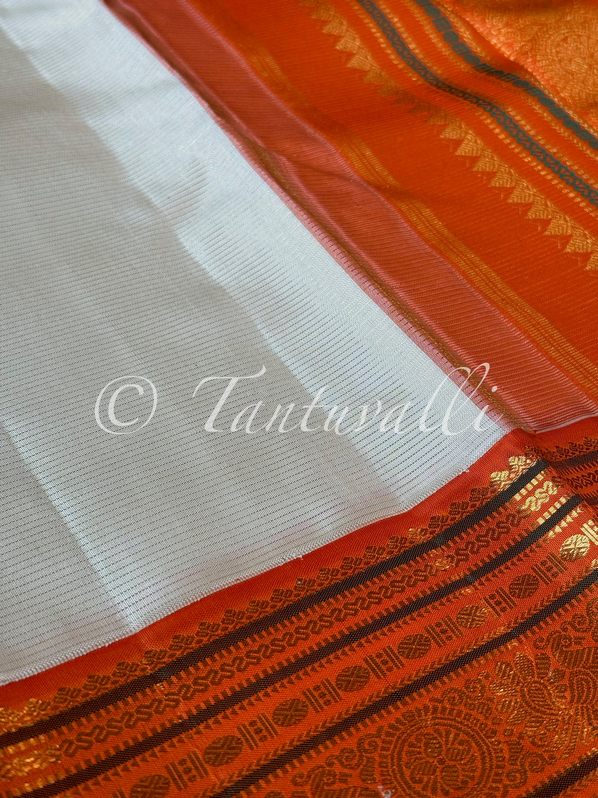 Ivory Vaira Oosi with Orange Varisaipet Korvai