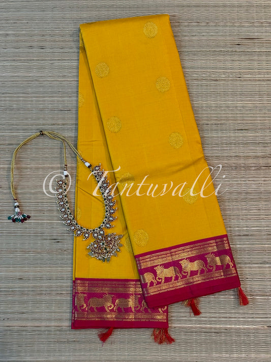 Mango Yellow with Pichwai Cow Motifs Rani Pink Small Border Korvai