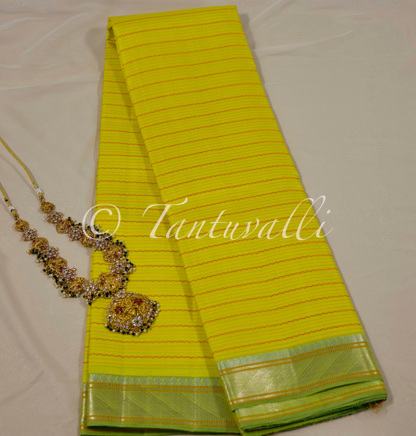 Yellow with Sneha green Zari