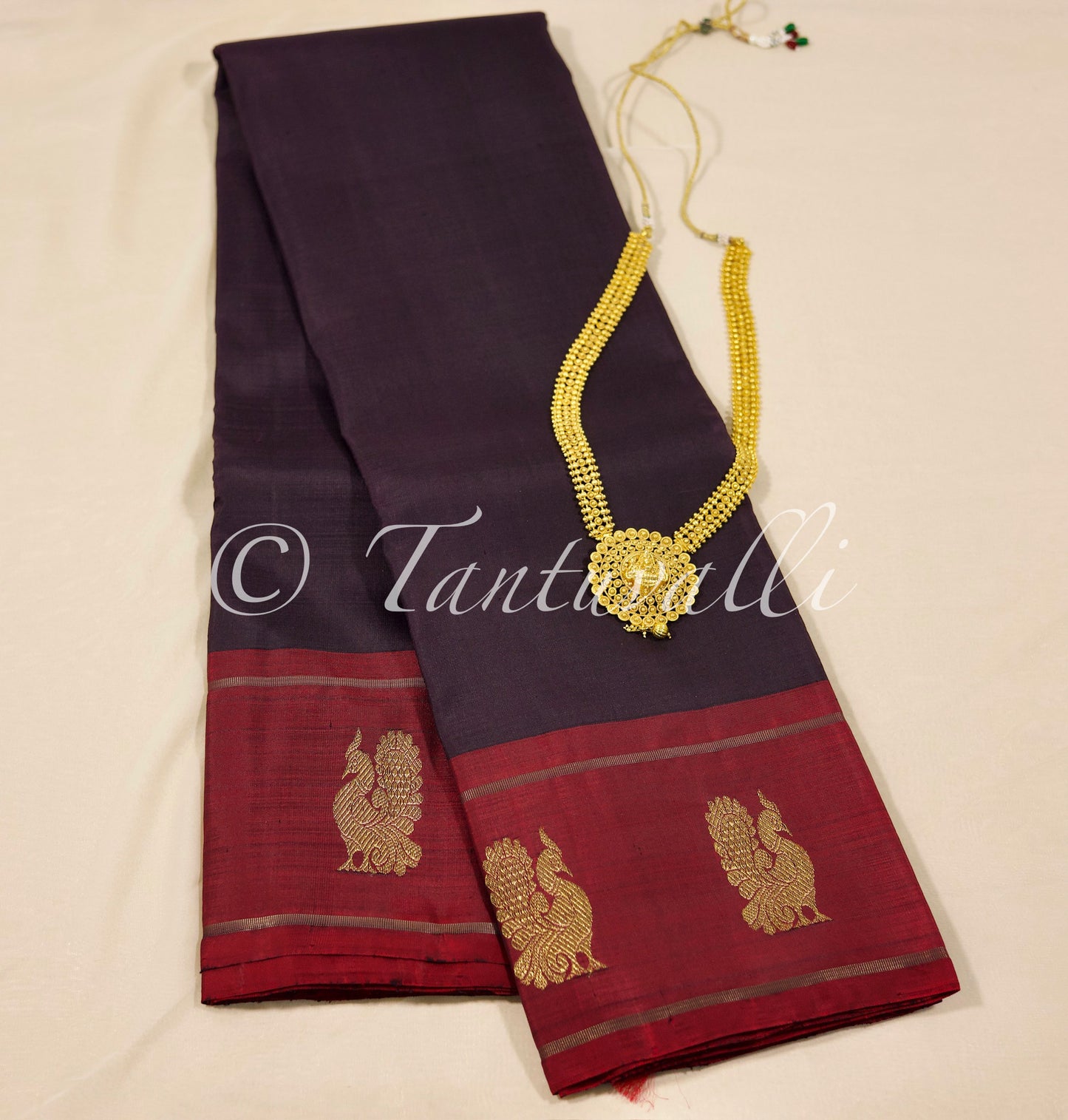 Kanchana brown with Maroon Korvai